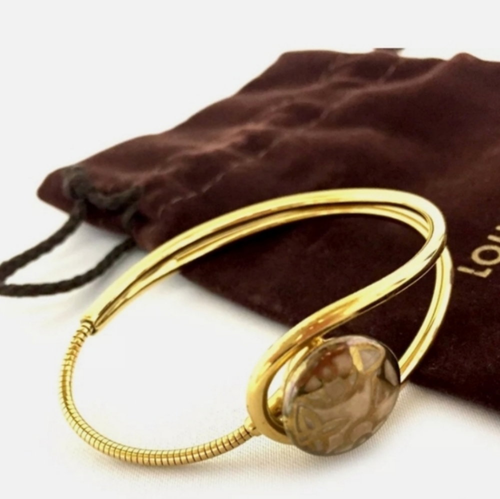 LOUIS VUITTON CELESTE MAGNET GOLD TONE BRACELET - Picture 16 of 16